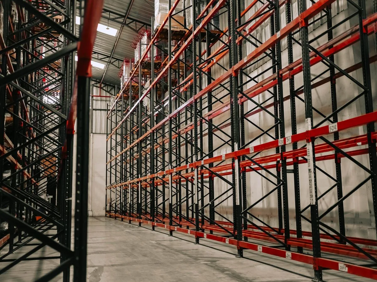 Metal storage racking and high ceiling inside a secure storage facility