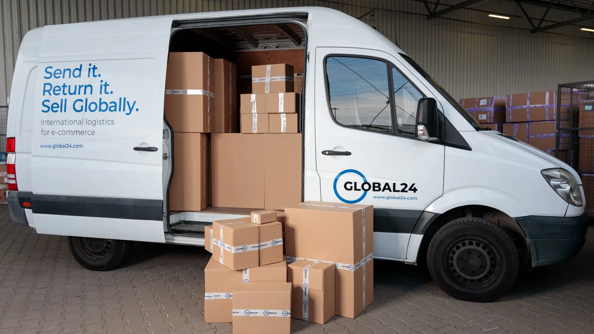 Van loaded with cardboard boxes ready for a small removals job