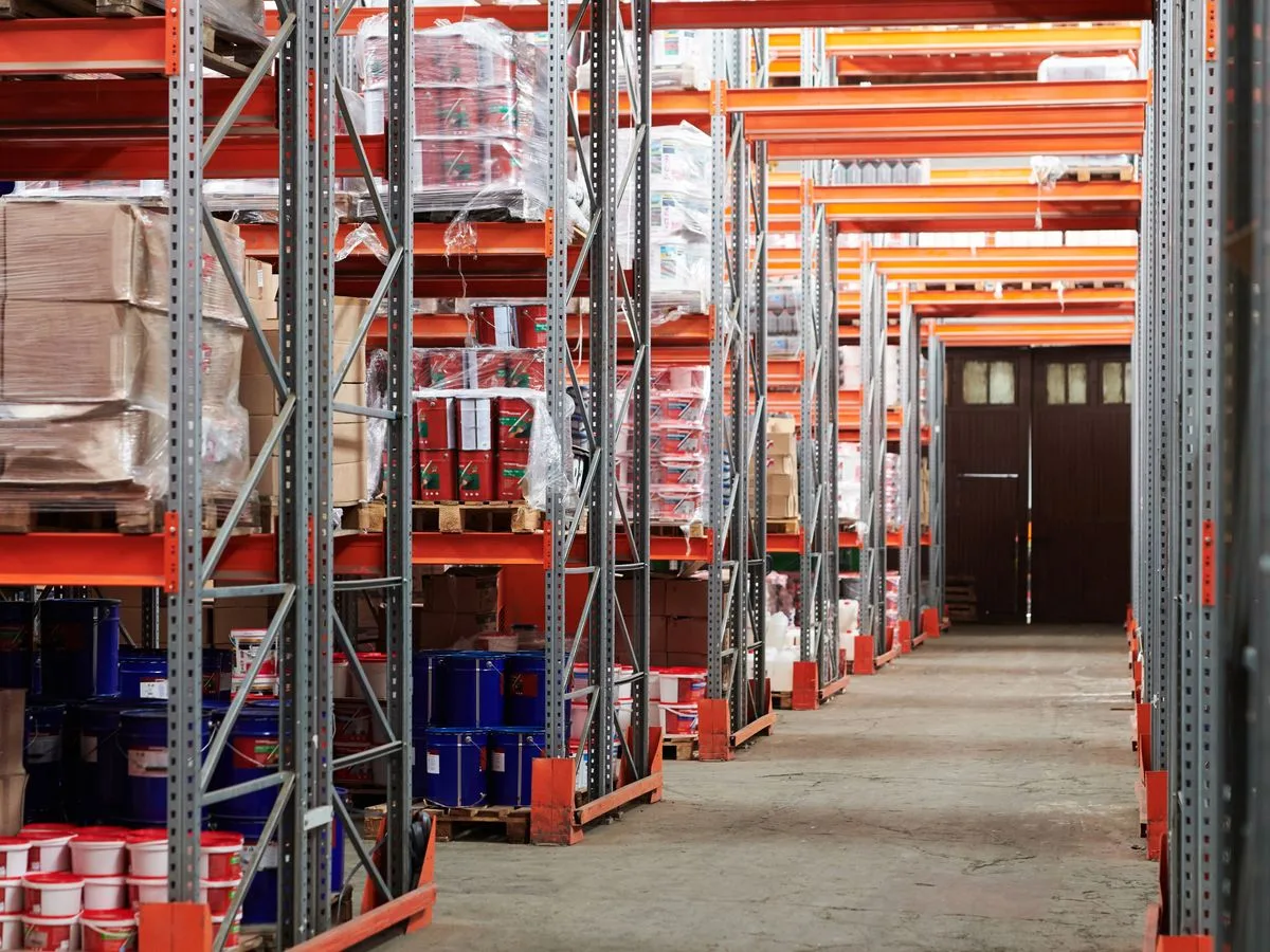 Shelves of packaged goods organised inside a secure storage warehouse