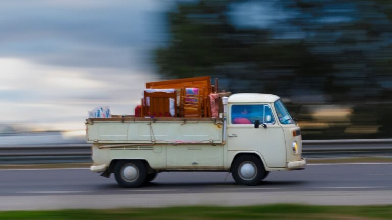 Van loaded with furniture on the road